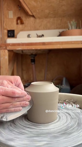 Trimming an Angled Tumbler in Pottery