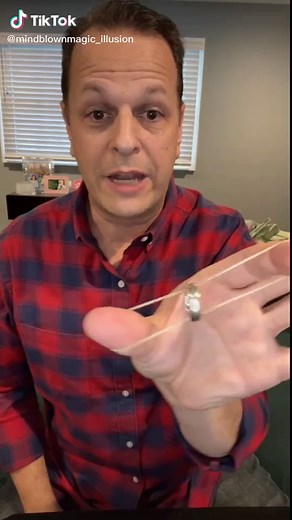 Ring through band trick #magictrick #magician