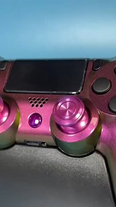 Don’t blend in, shine with our Purple Chameleon Edition PS4 Custom Controller! 🎮 With a gorgeous purple look with hints of pink and green, you’ll rise above the competition both in the game and when you play. #ps4controller #customcontroller #gamingcontroller #ps4gaming | Custom Controllers