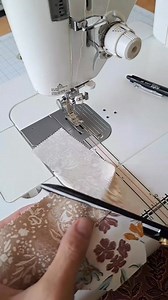 Another fun little coaster! This one started with a 2.5" hexagon, then I added 2" strips around the outside. For the first strip, I used a partial seam so the last strip could be sewn to the base hexagon like the rest of the strips. Then you can see I go back to the first strip and sew it to the last strip. Kind of a fun way to do the strips around the outside. I quilted with straight lines (but haven't bound it yet). Since it only has batting in it, I'll use it as a mugrug, but you could add In