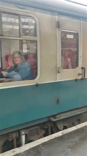 ex-Scotrail Class 47 47 555 pulling into Bury.