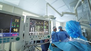 Heart rate monitor in hospital theater. Close up view of ECG monitor in operating room