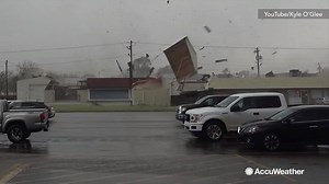 WOW! This incredible video shows the roofs being torn off and sparks flying from power lines due to a tornado in Springhill, Louisiana on Saturday. | AccuWeather