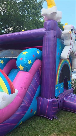 Magical bouncy castle with water slide in my yard!