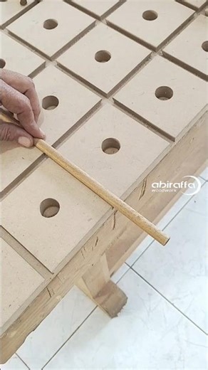 Using a bench-top groove as a holder when cutting a dowel #woodworking #tips #tricks