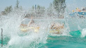 Happy fun loving group of friends jumping, splashing and playing in the swimming pool at a pool party. 20s. 1080p Slow Motion Stock Video