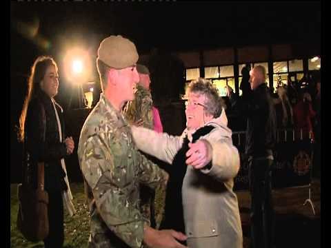 Emotional Homecoming: First British troops to be withdrawn from Afghanistan arrive back at Catterick
