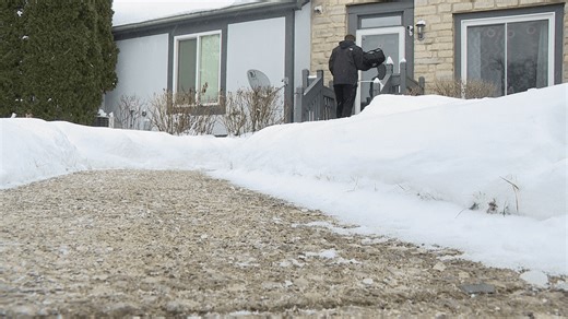 Pizza delivery drivers deal with snowy streets and sidewalks to drop off a slice of warmth
