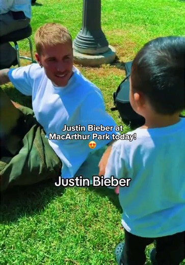 Justin Bieber at MacArthur Park today singing with friends