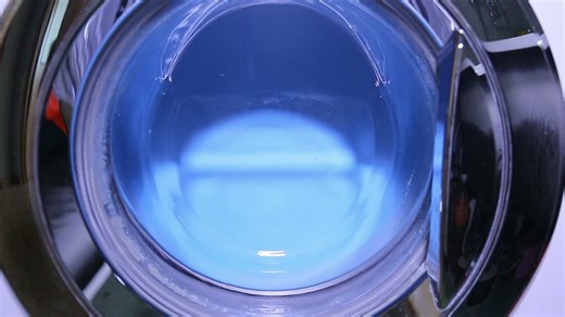 Washing machine drum spinning with laundry - Free Stock Video