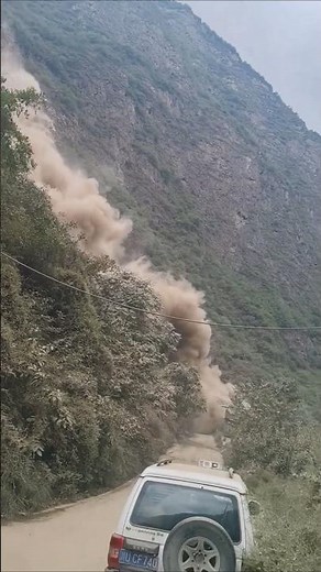 Sudden Rockslide Crashes Toward Mountain Road