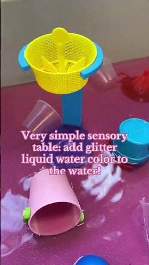 Magical Water Sensory Play! ✨🎨 Learn how to enhance your sensory table with glitter liquid