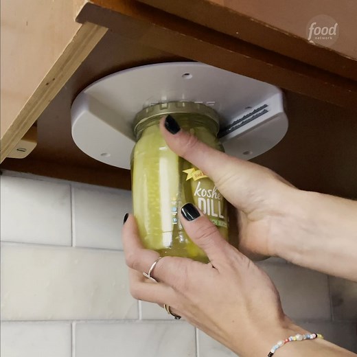 NEVER struggle with opening jars again thanks to this under-cabinet jar opener! 🤯👏 It's V-shape allows it to open any size jar, and it sticks riiight under a cabinet instead of taking up precious counter or drawer space. Get it on Amazon: https://amzn.to/3J2MBB9 (We may make 💰 from these links!) | Food Network