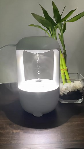"Transform any room into a calming sanctuary.  The Anti-Gravity Humidifier creates a mesmerizing floating water-drop illusion while releasing a gentle, soothing mist — perfect for bedrooms, living rooms, or your workspace. Breathe better, sleep better, live better." | Zaarvia | Facebook