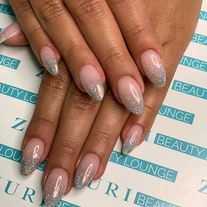 Nude and glorious #nailextentions in almond shape❤ from simplicity to perfection 💎 Book with #novemberspecial price 🌟🌟🌟 Call on 0504049601. | Zuri Beauty Lounge