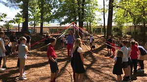 Pre-K students celebrate spring with traditional maypole