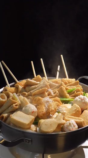 Fish Cake Soup is a classic Korean dish with savory broth and tender fish cakes simmered with vegetables. Light yet flavorful, this comforting soup is perfect for a cozy meal or a warming side dish. Cook Time: 10-15 minutes Serving Size: Serves 2 INGREDIENTS: Coin soup base 2 pcs Soy sauce 1 tbsp Water 2 cups Assorted fish cakes 3 cups Radish, cut into bite-sized pieces 1 cup Chopped green onion 1 tbsp STEPS: 1. Cut radish into bite-sized pieces and chop green onion. 2. In a pot, bring water to 