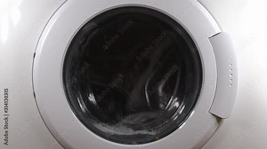 Empty washing machine spinning as part of the cleaning process