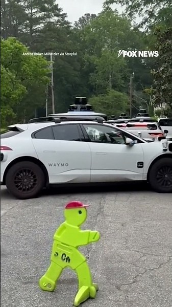 Empty Waymo cars SWARM neighborhood, residents stunned #foxnews #news #shorts #cars #tech