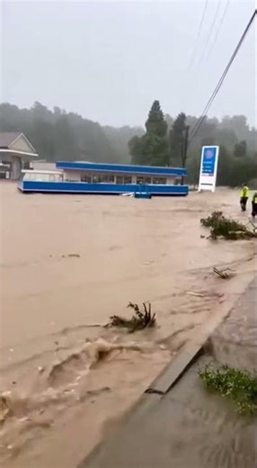 FLASH FLOOD EATS GAS STATION! Watch the Canopy Collapse