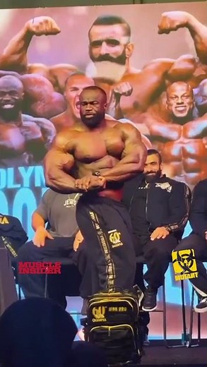 Samson Dauda pose off at the 2024 Mr. Olympia Press Conference