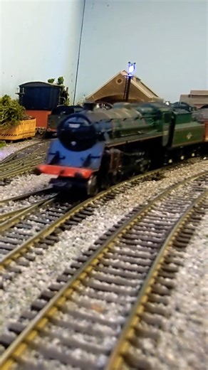 BR Standard 4MT 2-6-0 hauling the coal train.