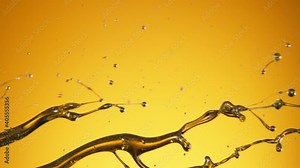Super slow motion of splashing oil on golden background. Filmed on high speed cinema camera, 1000 fps