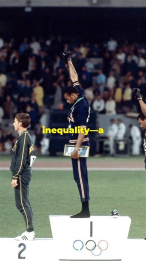 In 1968, two Black American athletes—Tommie Smith and John Carlos—stood on the Olympic podium and raised their fists in silent protest. That single moment of courage echoed around the world, challenging racism and inspiring generations to stand tall for justice. ✊🏾 Their salute wasn’t just about medals—it was about freedom, unity, and equality. 🖤 #BlackFeelings494 | The Movement Lives On. #BlackHistory #1968Olympics #TommieSmith #JohnCarlos #BlackPowerSalute #CivilRightsMovement #BlackExcellen