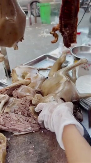 Steamed dog meat, a street food dish