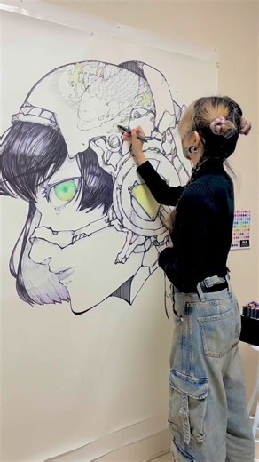 OLO marker on Instagram: "Watching a large-scale piece come together is always something special 🤯 🙌 Here’s Shinn Uchida (@mangalivepaint) in the process of building one of her signature mural-scale illustrations using OLO™ markers, layering soft color, line work, and detail across a massive surface. This approach reflects the same techniques she brings to her live mural paintings and event work.⁠ ⁠ Her OLO x Shinn Uchida Artist Set is available now for presale, with exclusive bonus items incl