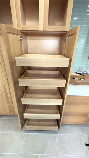 Here’s some pantry pull outs we custom made and installed for this kitchen remodel we’re close to wrapping up. We make sure all the details matter, I know it looks like they’re just pull out shelves. But we installed the bottoms four pullouts the same few inches away from each other for regular height storage and the top section is a bit higher for talller cereal and other tupper wear boxes. Each pullout can hold approximately 100lbs, giving our clients the ability to fill them up with ease. #ki