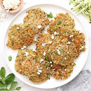 Zucchini Feta Fritters, a fabulous summer side dish to make great use of in-season zucchini and mint. PRINT: https://www.skinnytaste.com/zucchini-and-feta-fritters/ | Skinnytaste