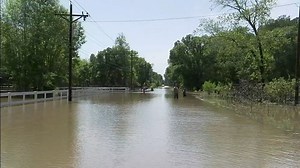 Trinity Co. crews help neighbors escape flooding by boat while Montgomery Co. issues evacuation