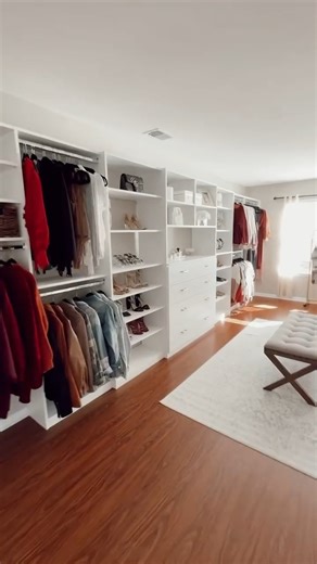 This en suite area was transformed into Samantha's dream closet! Her luxurious space combines elegance and functionality to meet her needs and showcase in the ultimate closet/dressing room! ⁣ ⁣⁣ #ClosetsbyDesign #HomeOrganizers #ClosetGoals #GetOrganized #StayOrganized | Closets By Design