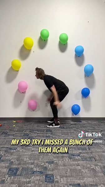 POPPING 10 BALLOONS WITH A BACKFLIP! Location: @motivemovement in Greenville, SC