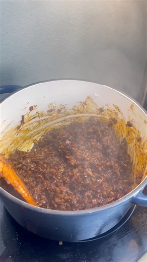 🔥 THE MEAN CHILI 🔥This isn’t your average chili… it’s deep, smoky, and built with layers of bold flavor — fire-roasted chiles, smoky chipotle salsa, three kinds of sausage, and a secret touch of cocoa powder that makes every bite unforgettable. 😮‍💨What makes it mean is how it’s cooked — slow-baked in the oven for hours until it thickens up and every spice blends perfectly. The flavor gets richer, meatier, and more addictive with every spoonful.🍲 Whether it’s game day, a cold night, or you j