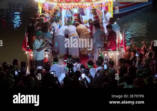 Masimagam Theppa Thiruvizha, Penang, Malaysia - Mar 12 2025: Aerial perspective captures floating chariot at Masimagam Theppa Thiruvizha Stock Video Footage - Alamy