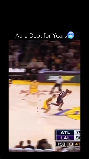 HoopState on Instagram: "The reel features a classic highlight moment from the prime of Kobe Bryant’s career, during a game against the Atlanta Hawks (score shows Lakers leading 98-75). Kobe is seen bringing the ball up the court and initiating a one-on-one drive against his defender. He executes a devastating crossover or hesitation move, completely faking out the Hawks player who stumbles and falls to the ground. This move, which leaves Kobe open for an easy finish, perfectly sets up the drama