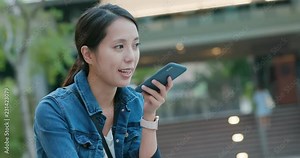 Woman send audio message on cellphone