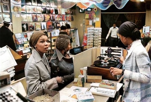 North Philadelphia: Back in the day record stores would play the album that you were about to buy. Two customers pictured purchased "That's The Way of the World" by Earth, Wind & Fire at the record store inside Progress Plaza on N. Broad Street between Jefferson & Oxford Streets in April of 1975. | Old Images of Philadelphia