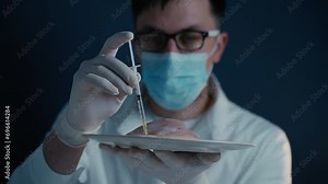 Genetically modified meat. GMO food concept. Genetic injection. Food scientist injecting raw meat. Lab assistant testing GMO chicken. Food quality control. Growing cultured meat.