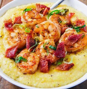 This cheesy bacon Shrimp 'N Grits can be yours in just 30 minutes. Full recipe: http://dlsh.it/cTtr8RS | Delish