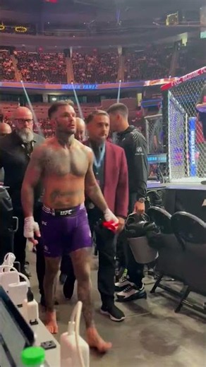 Cody Garbrandt takes off gloves after UFC 329 knockout loss