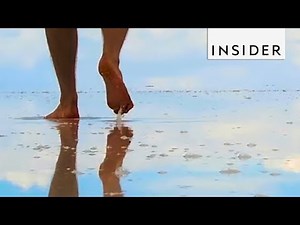 Mirrorlike Salt Flat In Bolivia