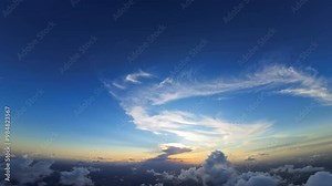 Beautiful blue sky with light clouds of unusual shape. Footage from FPV drone over the cumulus clouds high above the ground.