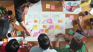 Top view of business team making scrum task board at meeting room. Convocation. | Free Stock Video Footage