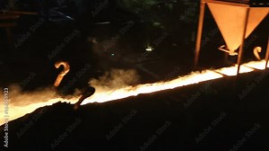 Molten steel pouring Detail in foundry, molten metal is being transported to be poured from ladle for casting. Stock Video