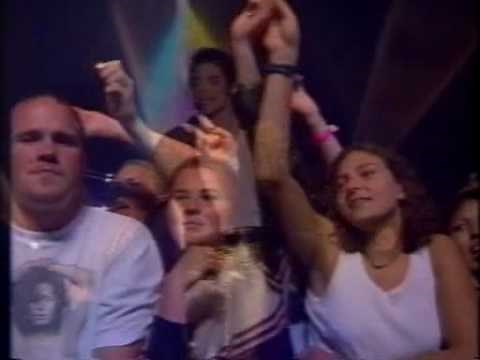 Fan hugging Michael Jackson and singing '' You Are Not Alone''