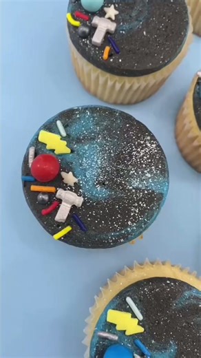 Thor inspired galaxy cupcakes with glittery sprinkles