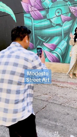 Modesto Murals are perfect for your next photo backdrop 📸🤳 You can now enjoy the amazing street art of Modesto by taking a self guided audio tour to learn about the Muralists and the inspiration behind their art🎨 For more info about the Modesto Street Art Audio Tour, visit the link in our Bio 🎆 #visitmodesto #modestocalifornia #centralvalley #traveltok #thingstodo #modesto #modestoca #streetart #artwalk #mural #audiotour #phototips #photospots #muralstreetart